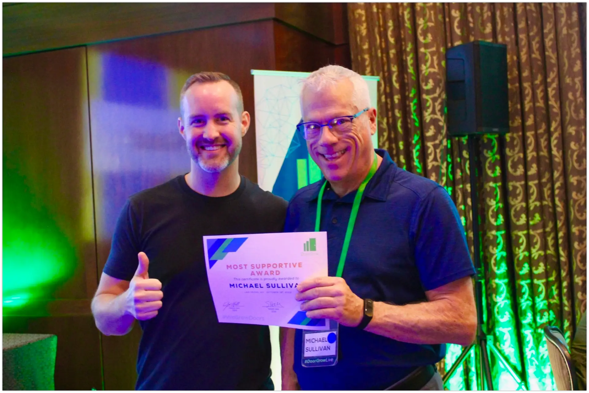 Michael Sullivan receiving a DoorGrow Most Supportive award