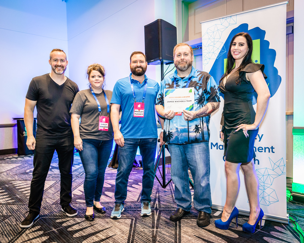 Foundation PM team receiving a DoorGrow 1000 Doors award